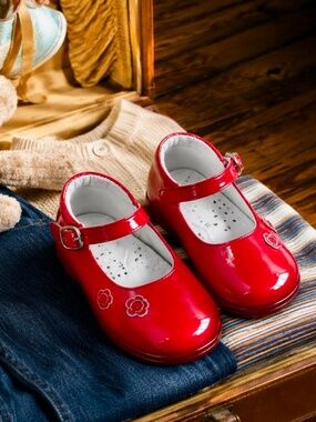 Girls orthopedic red leather shoes.